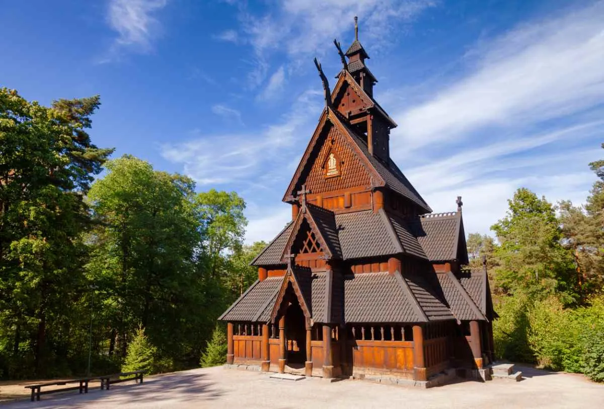 Gol Stave Church, a traditional wooden medieval church, surrounded by trees in Oslo.