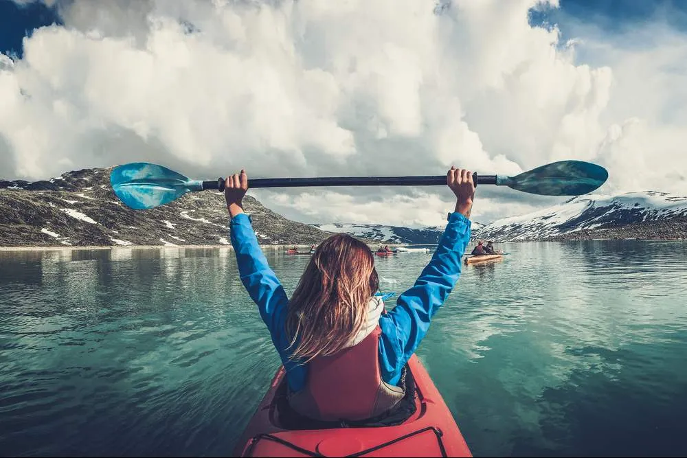 Woman with kayak in Jostedalsbreen