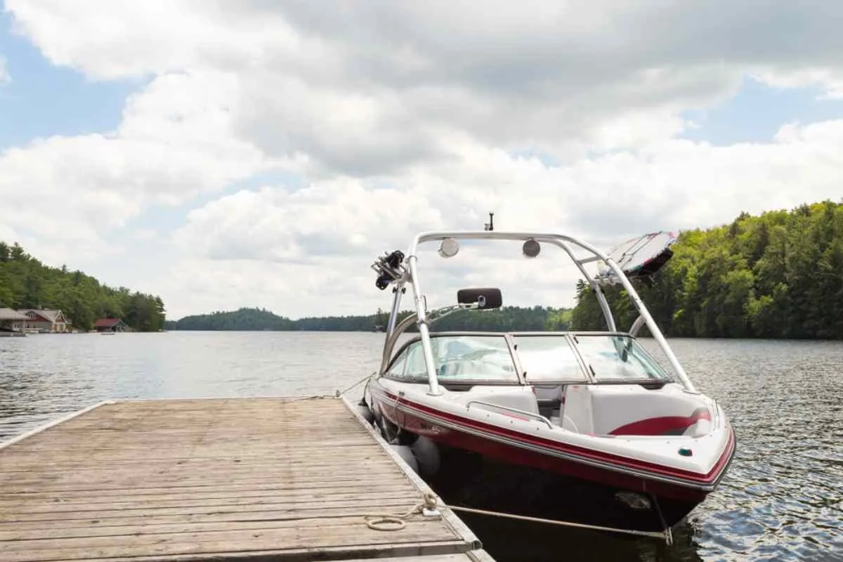 Close-up of a boat moored at a dock on a Norwegian lake.