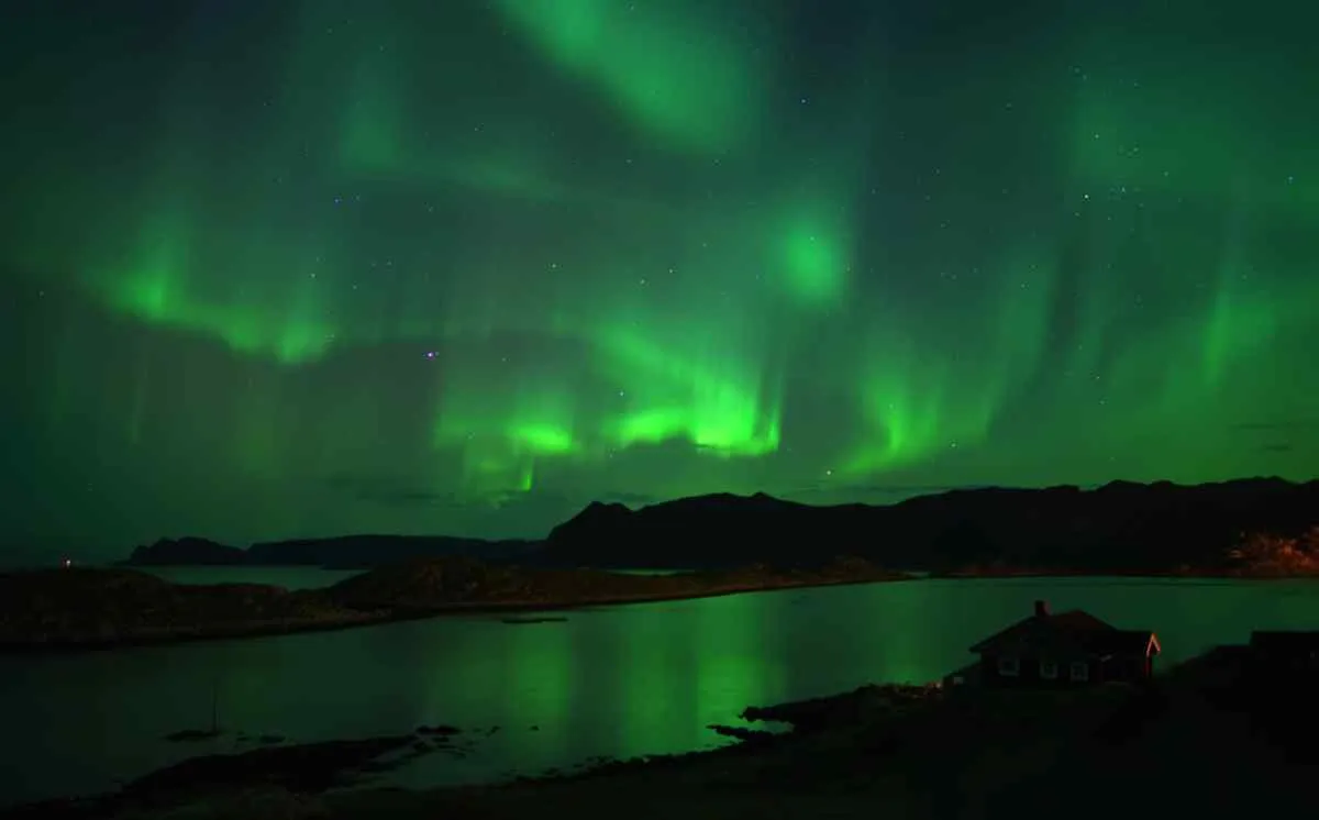 General view of the northern lights over the northernmost region of Norway.